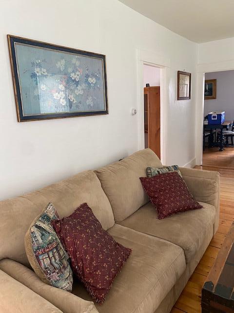 58 Main St, Sangerville, ME 04479 - living room with wood finished floors