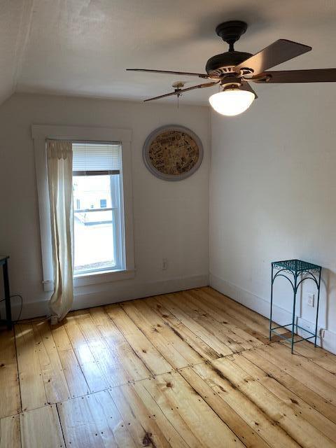 58 Main St, Sangerville, ME 04479 - additional living space with light wood-style flooring, ceiling fan, and vaulted ceiling