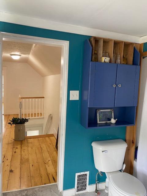 58 Main St, Sangerville, ME 04479 - bathroom featuring toilet and baseboards