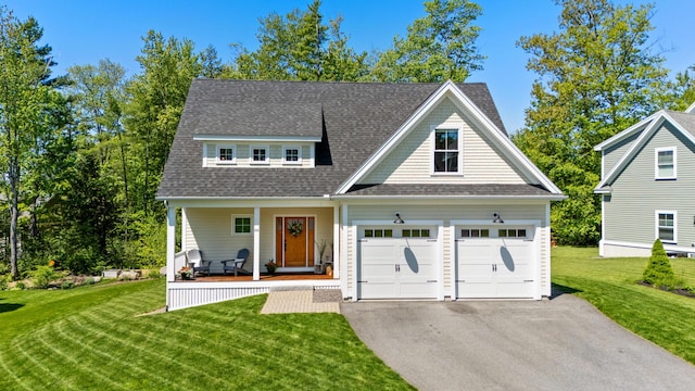 66 Old Dynamite Way, Gorham, ME 04038 - view of front facade with asphalt driveway, a porch, a front yard, a garage, and roof with shingles