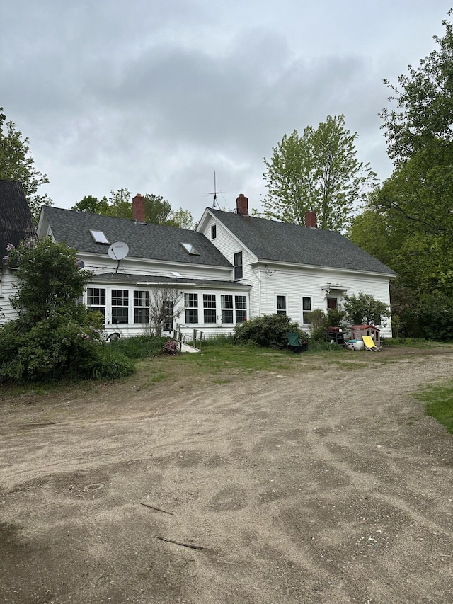 210 Ferguson Rd, Shapleigh, ME 04076 - back of property featuring a chimney