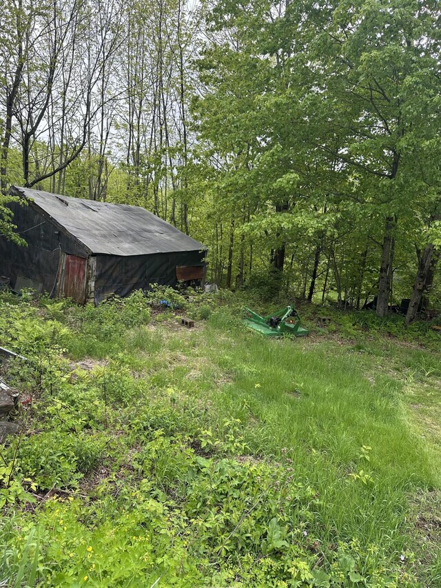 210 Ferguson Rd, Shapleigh, ME 04076 - view of yard featuring a pole building and an outdoor structure