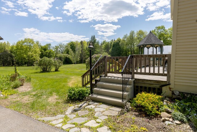 34 Mcphetres Rd, Sangerville, ME 04479 - view of grassy yard featuring a deck and a gazebo