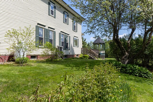 34 Mcphetres Rd, Sangerville, ME 04479 - view of home's exterior featuring a gazebo and a yard
