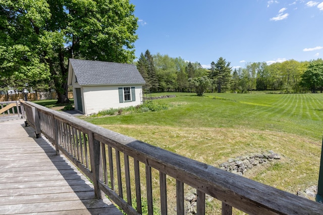 34 Mcphetres Rd, Sangerville, ME 04479 - wooden deck with a lawn and an outdoor structure