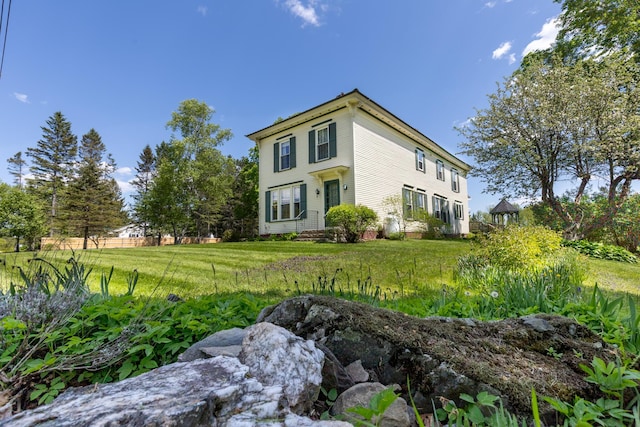 34 Mcphetres Rd, Sangerville, ME 04479 - view of side of home featuring a yard