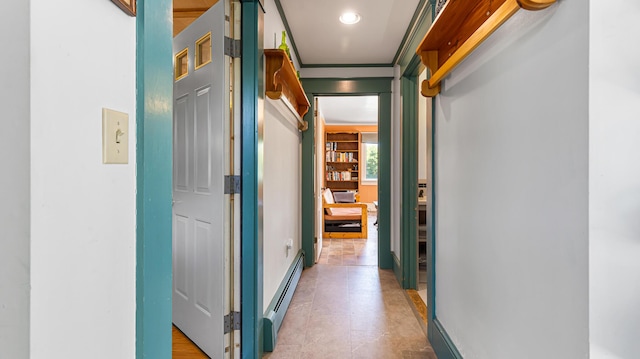 34 Mcphetres Rd, Sangerville, ME 04479 - corridor with a baseboard heating unit and baseboards