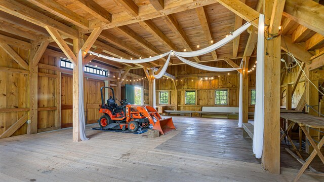 34 Mcphetres Rd, Sangerville, ME 04479 - miscellaneous room with wood ceiling with exposed beams, high vaulted ceiling, and hardwood / wood-style floors