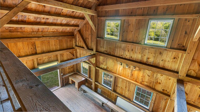 34 Mcphetres Rd, Sangerville, ME 04479 - stairs featuring wood ceiling, lofted ceiling, wood-type flooring, and wood walls