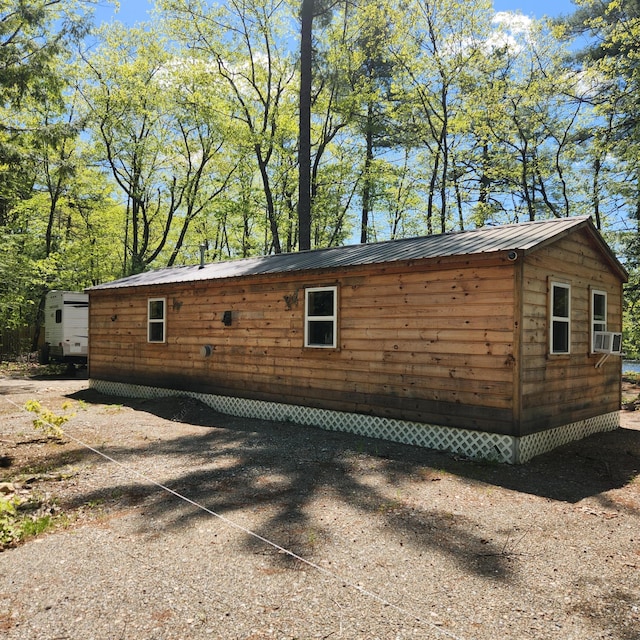 849 N Rd, Medford, ME 04463 - view of home's exterior with metal roof