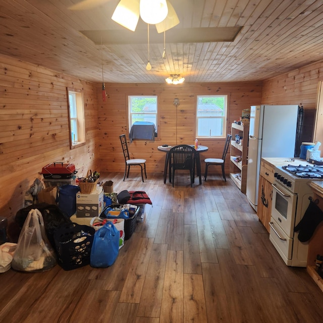 849 N Rd, Medford, ME 04463 - dining room featuring wooden walls, a ceiling fan, hardwood / wood-style floors, and wood ceiling