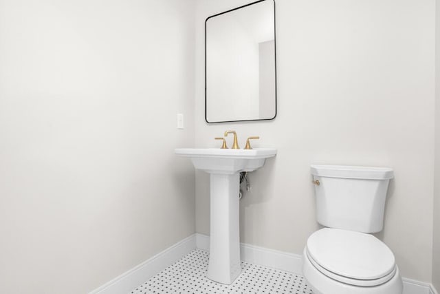 81 Creeks Edge Dr Unit 0, Saco, ME 04072 - half bathroom featuring toilet and baseboards