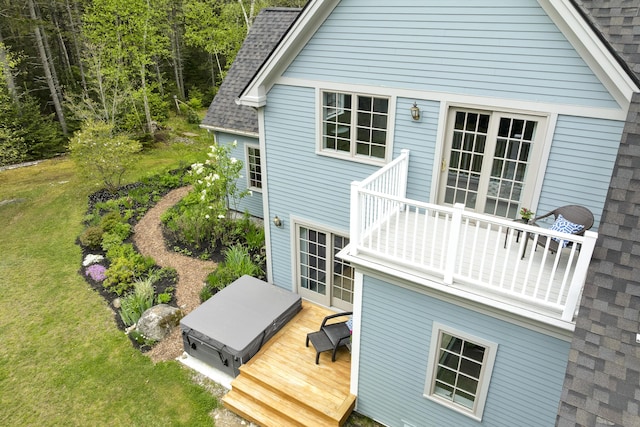 49 Moose Walk Rd, Westport Island, ME 04578 - rear view of house featuring a shingled roof, a deck, and a lawn
