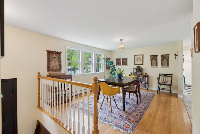 47 Woods Circle Rd, Yarmouth, ME 04096 - dining space with light wood-style floors and baseboards