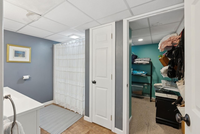 47 Woods Circle Rd, Yarmouth, ME 04096 - full bath with a drop ceiling, vanity, a shower with shower curtain, and baseboards