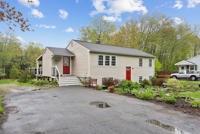 47 Woods Circle Rd, Yarmouth, ME 04096 - bi-level home with a chimney