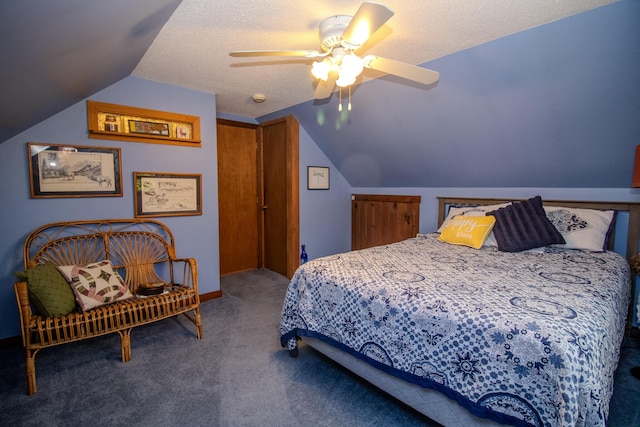 189 Stetson Rd E, Levant, ME 04456 - carpeted bedroom with vaulted ceiling, a ceiling fan, and baseboards