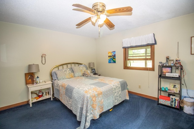 189 Stetson Rd E, Levant, ME 04456 - bedroom with carpet, a ceiling fan, and baseboards