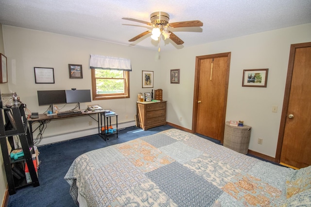 189 Stetson Rd E, Levant, ME 04456 - carpeted bedroom featuring a desk, baseboards, and ceiling fan