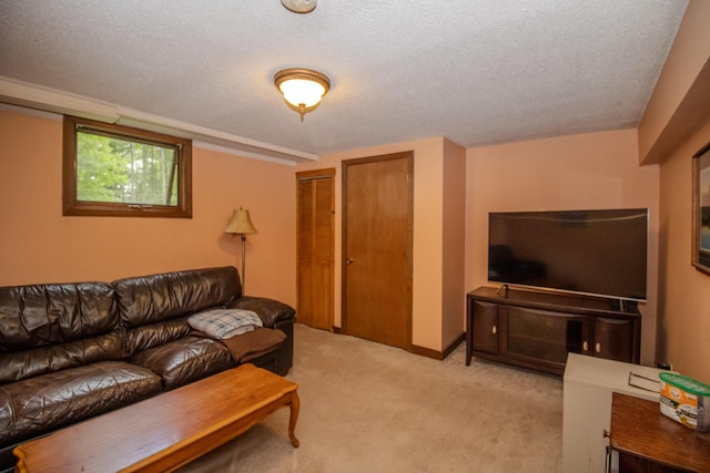 189 Stetson Rd E, Levant, ME 04456 - carpeted living room featuring a textured ceiling