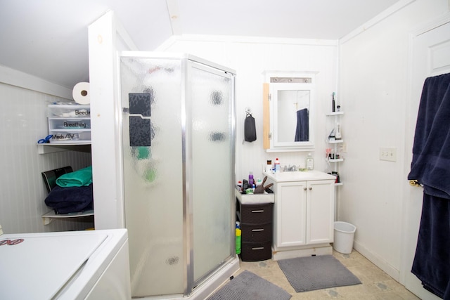189 Stetson Rd E, Levant, ME 04456 - bathroom with vanity, a shower stall, and washer / clothes dryer