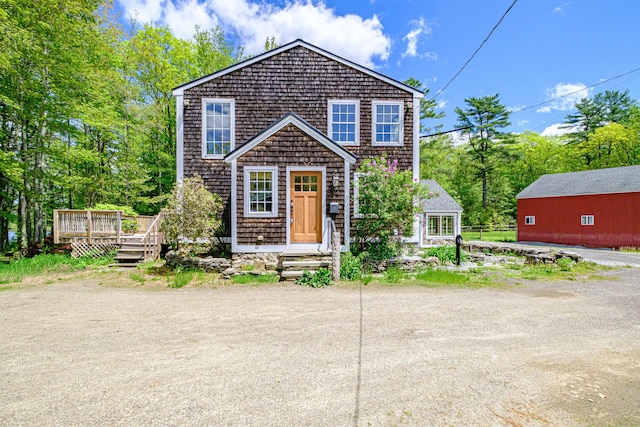 24 Cassella Dr, Jefferson, ME 04348 - view of front of property with a wooden deck