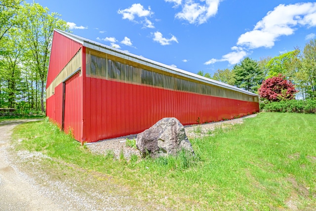 24 Cassella Dr, Jefferson, ME 04348 - view of property exterior featuring a pole building and an outbuilding