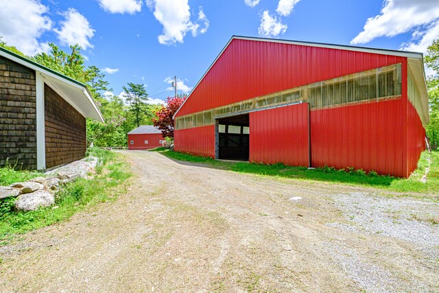 24 Cassella Dr, Jefferson, ME 04348 - view of pole building with driveway