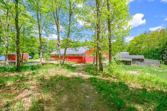 24 Cassella Dr, Jefferson, ME 04348 - view of yard featuring an outbuilding and a pole building