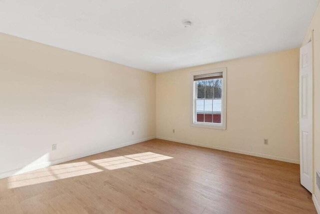 24 Cassella Dr, Jefferson, ME 04348 - unfurnished room featuring light wood finished floors, baseboards, and a smoke detector