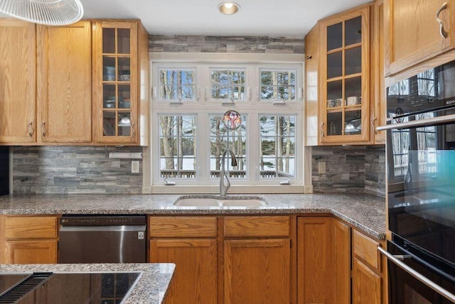 24 Cassella Dr, Jefferson, ME 04348 - kitchen featuring a sink, stainless steel dishwasher, decorative backsplash, and glass insert cabinets