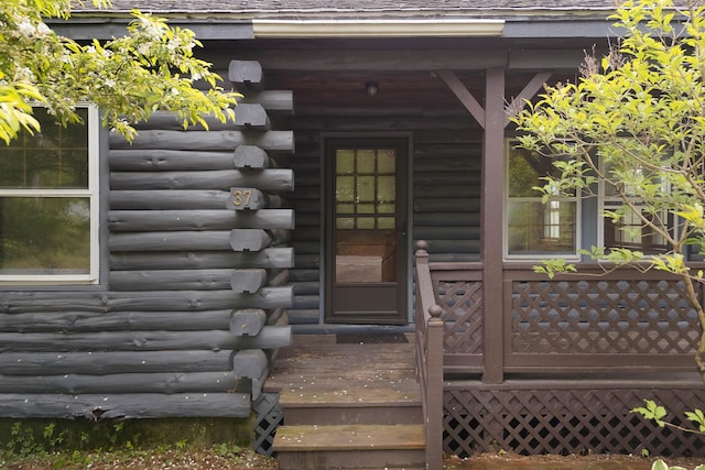 37 Boulder Dr, Auburn, ME 04210 - property entrance featuring log exterior