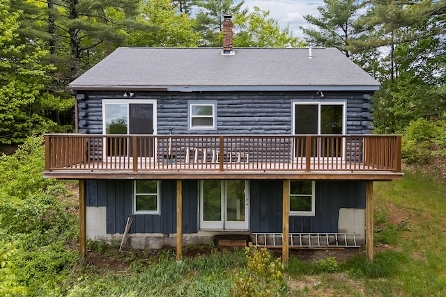 37 Boulder Dr, Auburn, ME 04210 - rear view of property with a wooden deck, log exterior, and a chimney