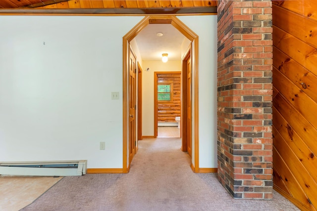 37 Boulder Dr, Auburn, ME 04210 - hallway featuring a baseboard heating unit, light colored carpet, and baseboards