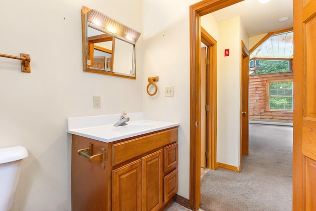 37 Boulder Dr, Auburn, ME 04210 - bathroom featuring toilet, vanity, and a baseboard radiator