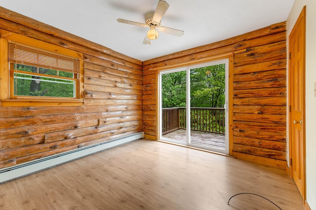 37 Boulder Dr, Auburn, ME 04210 - empty room featuring rustic walls, a baseboard radiator, wood finished floors, and ceiling fan