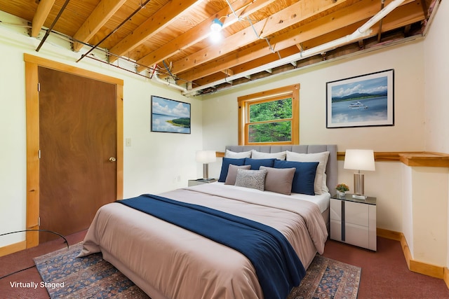 37 Boulder Dr, Auburn, ME 04210 - carpeted bedroom with baseboards and wooden ceiling with exposed beams