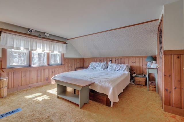 25 Church St, Gorham, ME 04038 - bedroom with wood walls, vaulted ceiling, carpet flooring, and baseboards
