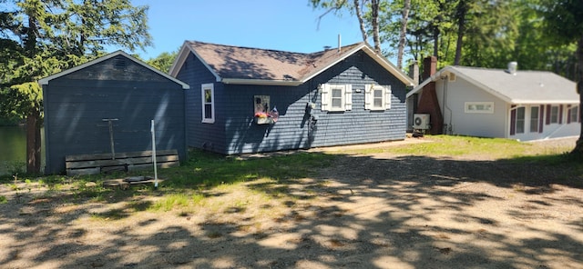 162 30th St, Shapleigh, ME 04076 - back of house featuring a shingled roof
