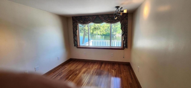 162 30th St, Shapleigh, ME 04076 - unfurnished room with dark wood finished floors and baseboards