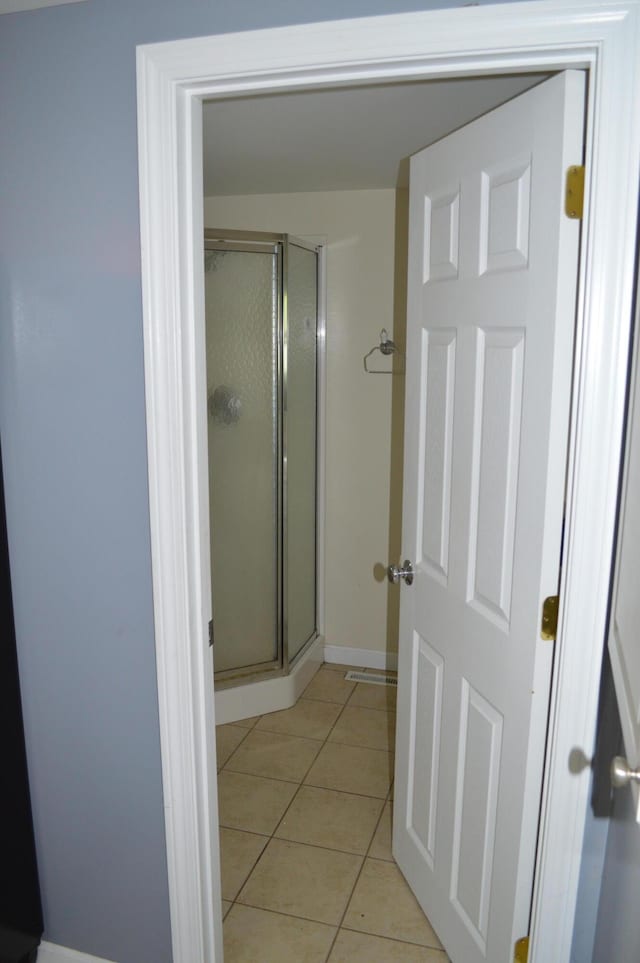 162 30th St, Shapleigh, ME 04076 - bathroom with a stall shower and tile patterned flooring