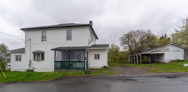 144 6th Ave, Madawaska, ME 04756 - view of front facade featuring a chimney