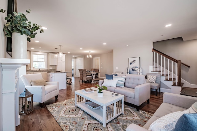 186 Falcon Crest Dr Unit 57, Gorham, ME 04038 - living area featuring a chandelier, wood finished floors, stairs, and recessed lighting