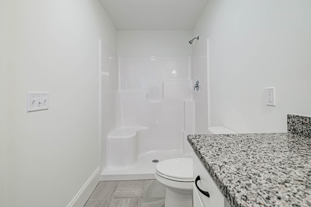 186 Falcon Crest Dr Unit 57, Gorham, ME 04038 - bathroom featuring toilet, a shower, and vanity