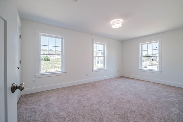 186 Falcon Crest Dr Unit 57, Gorham, ME 04038 - spare room featuring light colored carpet and baseboards