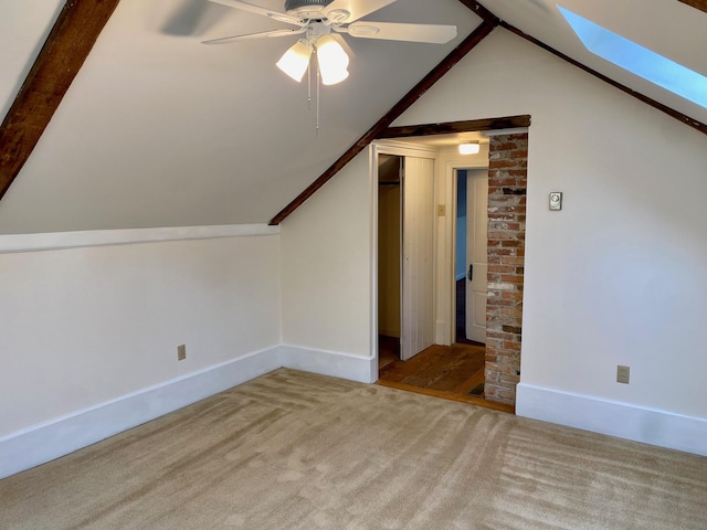 48 River Rd, Buxton, ME 04093 - bonus room featuring a skylight, carpet floors, vaulted ceiling, a ceiling fan, and baseboards