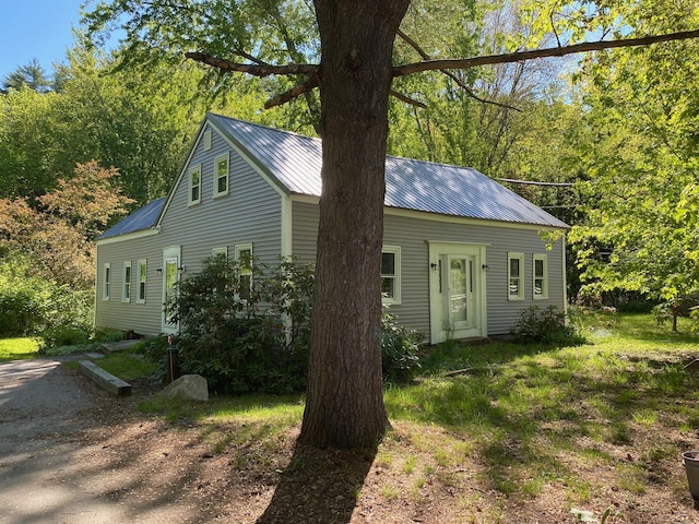 48 River Rd, Buxton, ME 04093 - view of front of home with metal roof