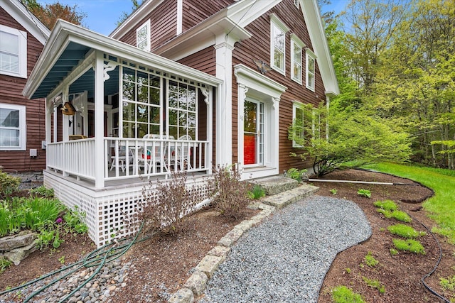 62 Blackswoods Rd, Franklin, ME 04634 - view of side of home featuring covered porch