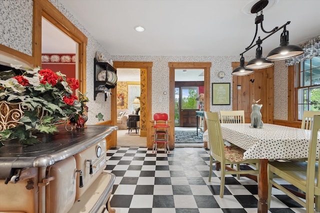 62 Blackswoods Rd, Franklin, ME 04634 - dining room with wallpapered walls and dark flooring
