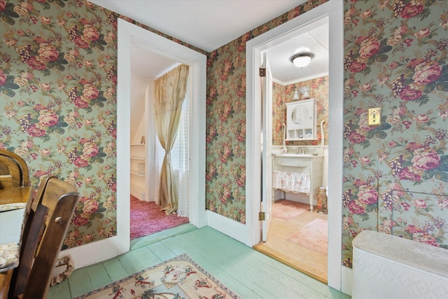 62 Blackswoods Rd, Franklin, ME 04634 - bathroom featuring wallpapered walls, wood-type flooring, and baseboards